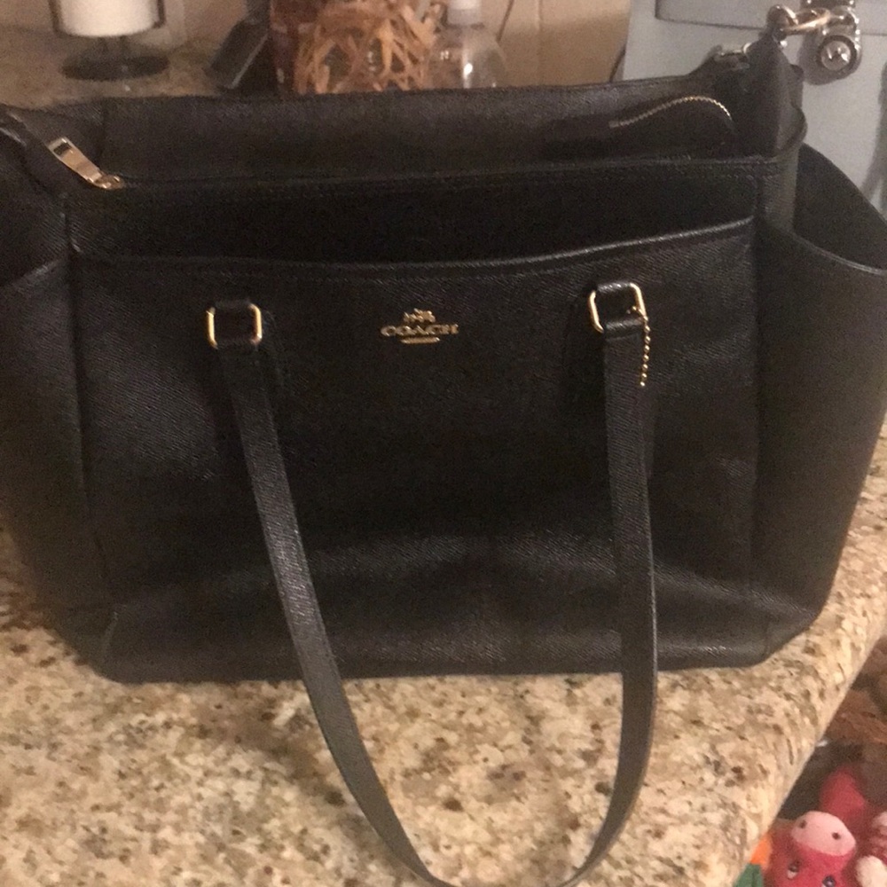 Black coach diaper bag used. Great condition